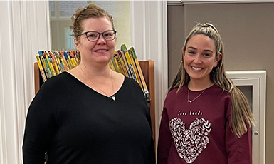  Teachers smile together named Educators' of the Year.